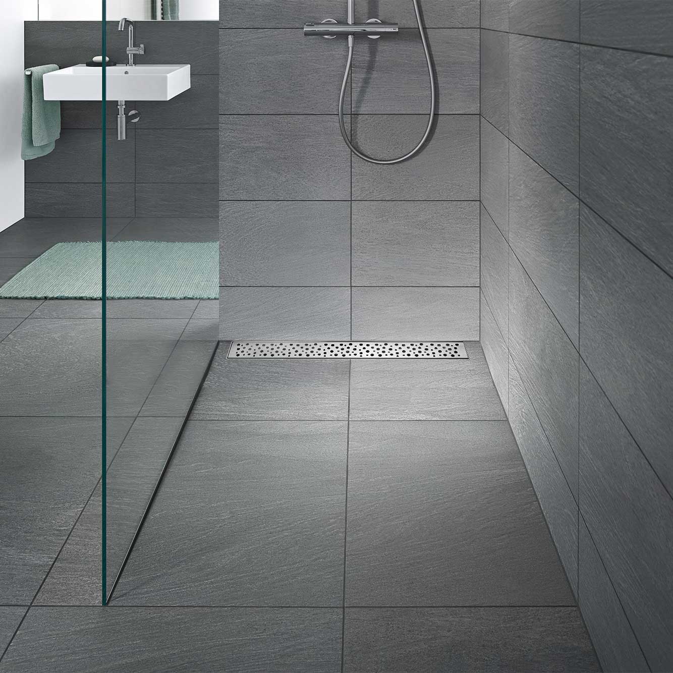 Duschrinne R5 aus Edelstahl für flache Installation mit Tropfenmuster Duschrinne R5 aus Edelstahl für flache Installation mit Tropfenmuster